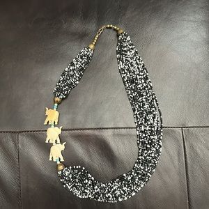 Black and white bead necklace with elephant trio